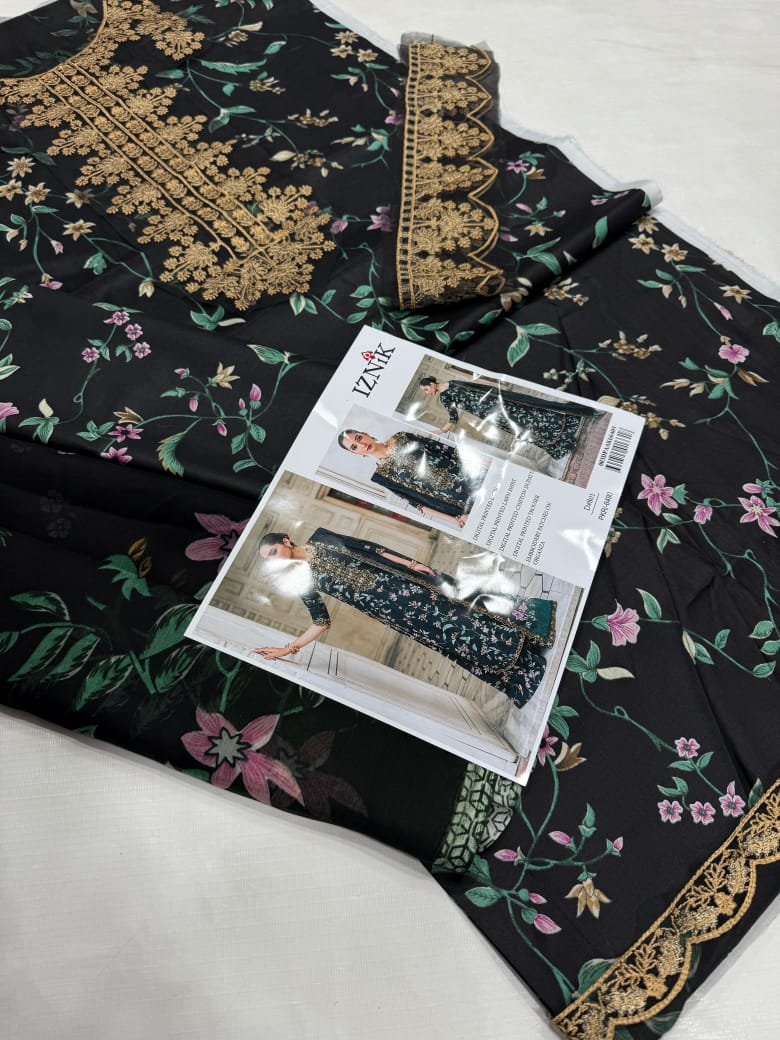 elevate traditional charm with a modern flair. Made from high-quality lawn fabric, this 3-piece suit