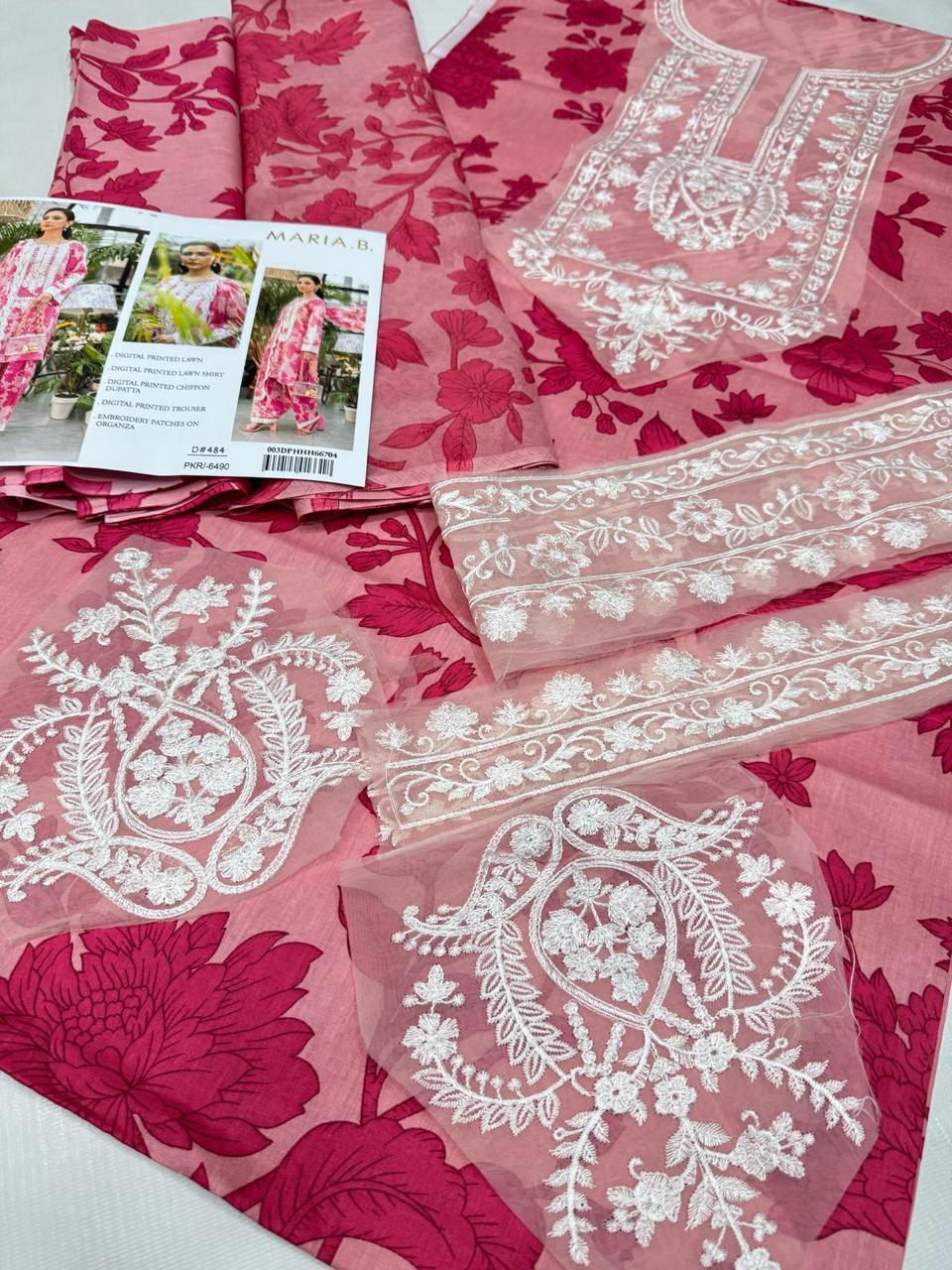 Maria.B patches  9070 Lawn ntroducing the stunning Maria.B Fabric: a perfect blend of elegance and tradition.