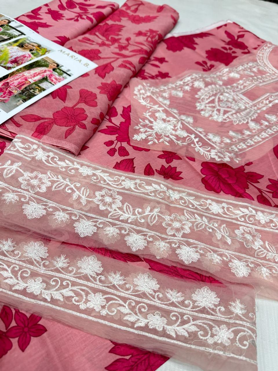 Maria.B patches  9070 Lawn ntroducing the stunning Maria.B Fabric: a perfect blend of elegance and tradition.